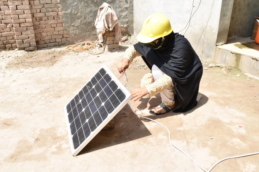 Female solar technician